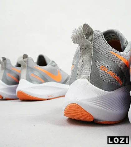 کفش کتانی مردانه طوسی نارنجی Nike guide 10