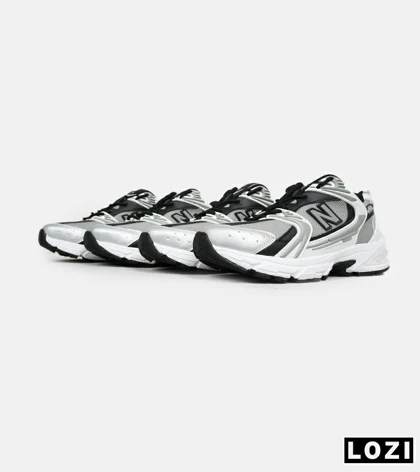 کفش کتانی مردانه و زنانه سفید طوسی مشکی NEW BALANCE 530 مدل 6642
