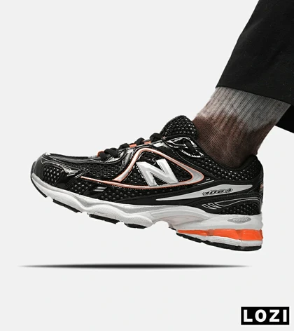 کفش کتانی مردانه و زنانه مشکی نارنجی NEW BALANCE 1064