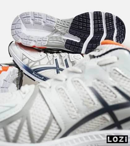 کفش کتانی سفید سرمه ای نارنجی ASICS KAYANO 20