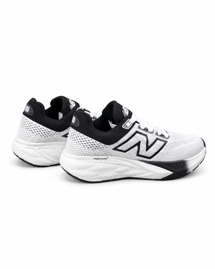 کفش کتانی رانینگ مردانه نیوبالانس زیره بست سفید مشکی New BALANCE