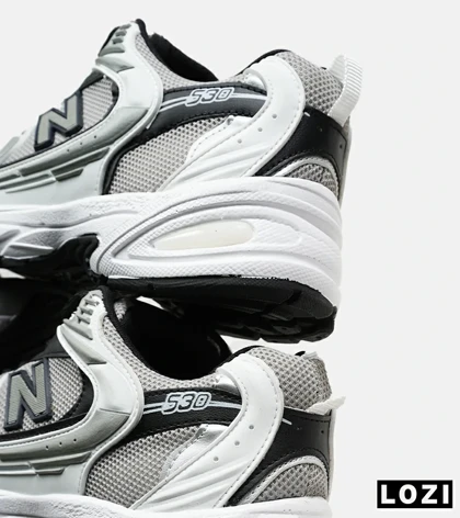 کفش کتانی مردانه و زنانه سفید طوسی مشکی NEW BALANCE 530 مدل 6642