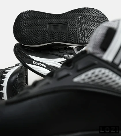 کفش کتانی ساق‌دار مشکی طوسی سفید Reebok Shaq Attaq
