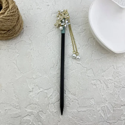 کانزاشی مو زنانه چوبی طرح گل با آویز مروارید مدل پرلورا