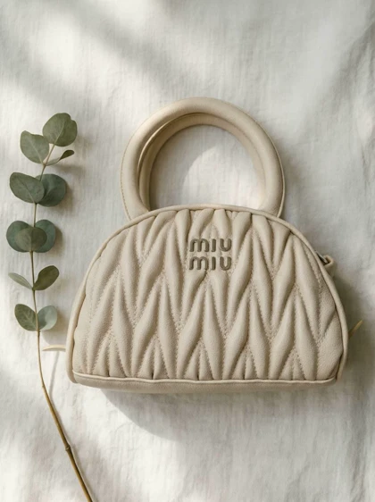 کیف پاسپورتی میومیو