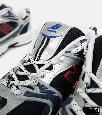 کفش کتانی مردانه و زنانه طوسی مشکی سرمه ای NEW BALANCE 530