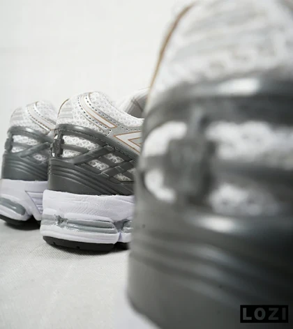 کفش کتانی سفید طوسی طلایی Newbalance 1906R