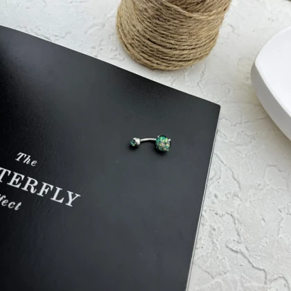 پیرسینگ ناف استیل با نگین اوپال