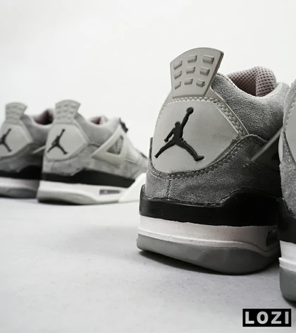 کفش کتانی ساق‌دار مردانه طوسی سفید Nike air jordan 4