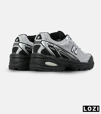 کفش کتانی مردانه و زنانه طوسی مشکی New Balance 509 مدل 7533