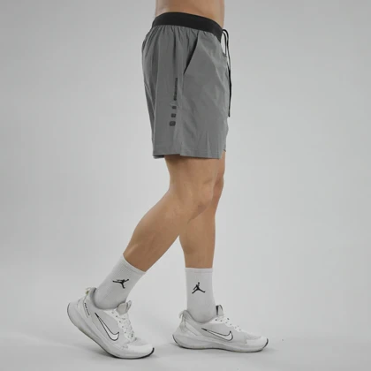 شلوارک ورزشی مردانه نایک مدل Dri Fit-D8056 طوسی روشن