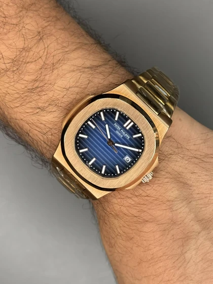 ساعت مچی پتک فیلیپ اتوماتیک بند فلزی رزگلد صفحه سرمه ای Patek Philippe Nautilus