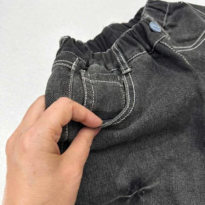 شلوار جین سنگ شور شده با دوخت سفید