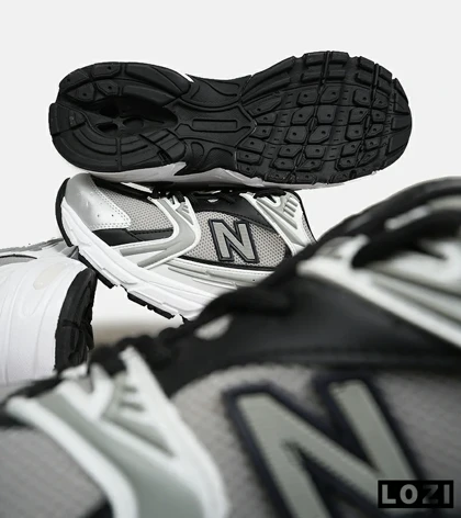 کفش کتانی مردانه و زنانه سفید طوسی مشکی NEW BALANCE 530