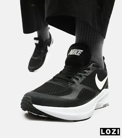 کفش کتانی مردانه و زنانه مشکی سفید Nike guide 10