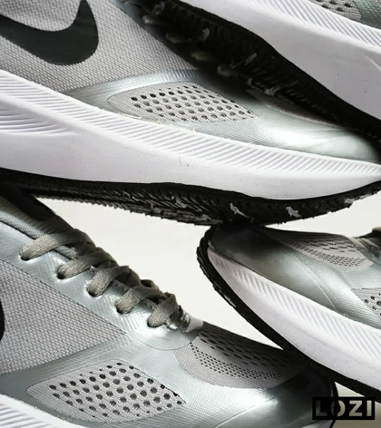 کفش کتانی مردانه طوسی مشکی Nike guide 10