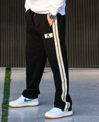 شلوار جاگر مشکی مردانه نوار سفید پارچه پنبه گلکسی بلنسیاگا فوق‌العاده خفن و جذاب