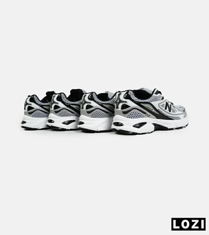 کفش کتانی مردانه و زنانه طوسی مشکی سفید NEW BALANCE 1064 V.2