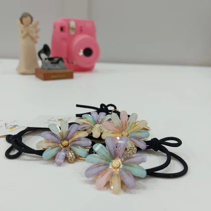 کش مو زنانه مدل فانتزی طرح بابونه