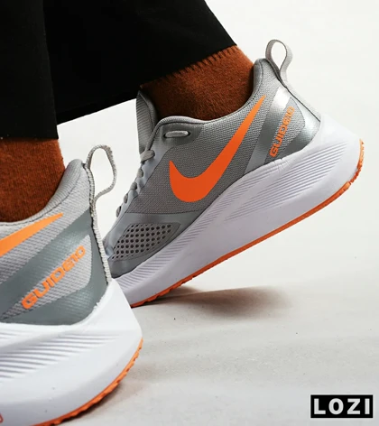 کفش کتانی مردانه طوسی نارنجی Nike guide 10