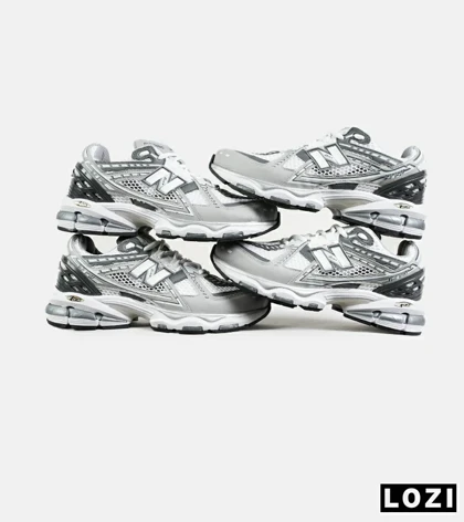 کفش کتانی طوسی سفید New Balance 1906R