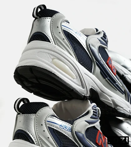 کفش کتانی مردانه و زنانه طوسی مشکی سرمه ای NEW BALANCE 530