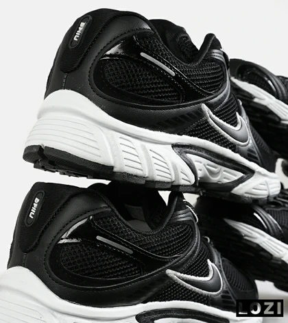 کفش کتانی مردانه و زنانه مشکی سفید نایک NIKE v5 RNR مدل 7329