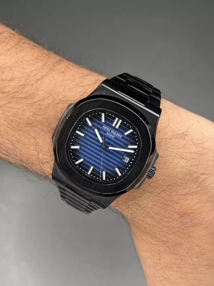 ساعت مچی پتک فیلیپ بدنه مشکی صفحه سرمه ای Patek Philippe Nautilus
