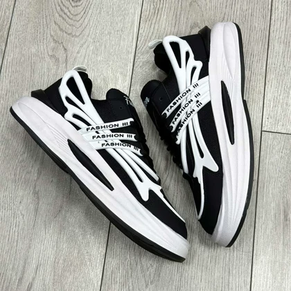 کفش و کتانی مردانه مدل FASHION رنگ مشکی و سفید