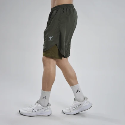 شلوارک کشاله دار ورزشی مردانه آندر آرمور مدل 4H0218 یشمی