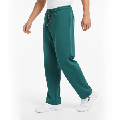 شلوار اسلش مردانه با قواره بگ رنگ سبز پارچه دورس دونخ پنبه استایل اسپرت و مینیمال 2025