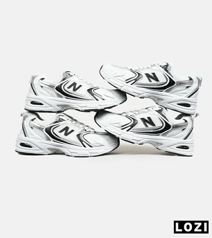 کفش کتانی مردانه و زنانه سفید مشکی NEW BALANCE 530