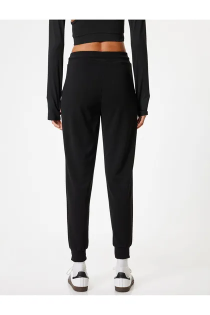 شلوار ورزشی Jogger جیب کمری توری مفصل با تناسب راحت 5WAK40042NK