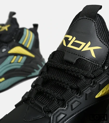 کفش کتانی ساق‌دار مشکی فیلی زرد Reebok Shaq Attaq
