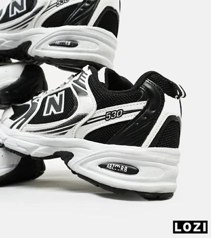 کفش کتانی مردانه و زنانه سفید مشکی NEW BALANCE 530