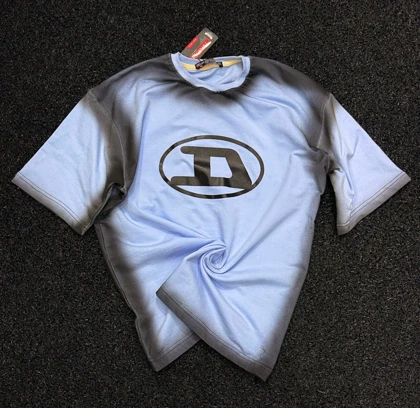 تیشرت دیزل باکسی رنگ آبی فیروزه ای با حاشیه مشکی پیسوله پارچه ماکان درجه یک کیفیت بالا