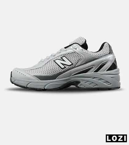 کفش کتانی مردانه و زنانه طوسی New Balance 509 مدل 7526