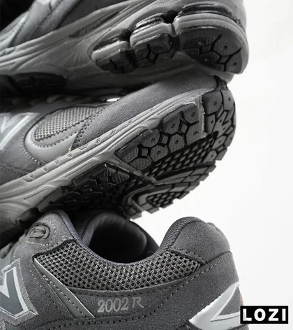 کفش کتانی طوسی NEW BALANCE 2002R