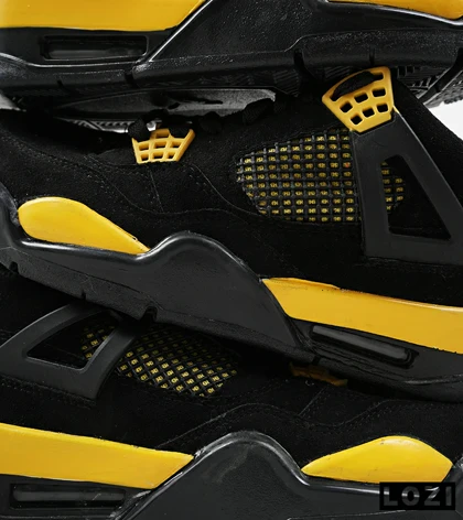 کفش کتانی ساق‌دار مردانه مشکی زرد Nike air jordan 4