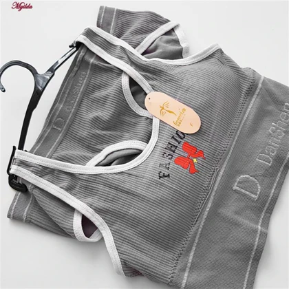 ست نیم‌تنه و شورت ورزشی زنانه خاکستری روشن مدل 4620