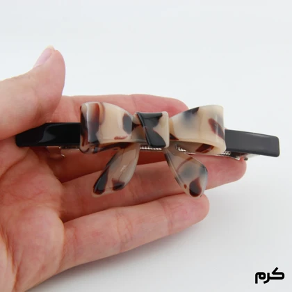 گیره مو دخترانه مدل پاپیونی خال‌خال