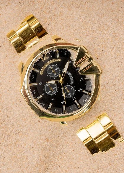 ساعت مچی DIESEL مردانه طلایی صفحه مشکی مدل U700 ویژه