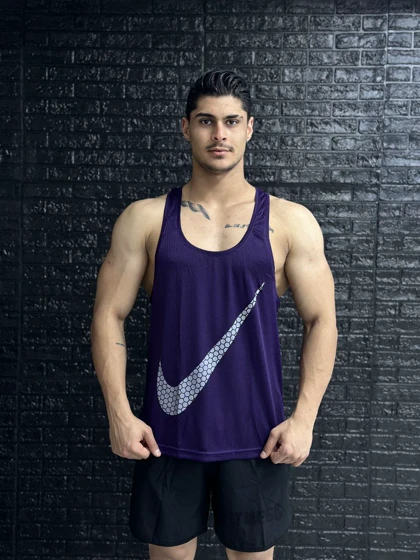 پکیج کد E1155 شامل رکابی + شلوارک نایکی با تم بنفش 💜👌