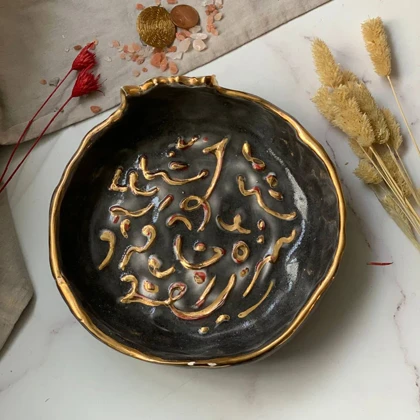 انار سیاه طلادار