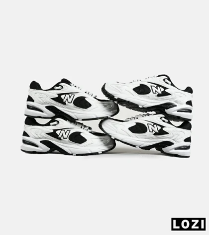کفش کتانی مردانه و زنانه سفید مشکی NEW BALANCE 725