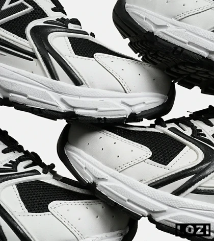 کفش کتانی مردانه و زنانه سفید مشکی NEW BALANCE 530