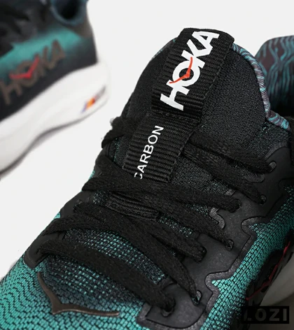 کفش کتانی مشکی سبز HOKA مدل 7396