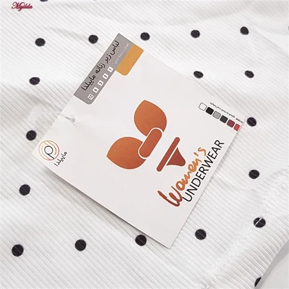 کراپ تاپ زنانه مدل پددار خال‌خالی رنگ سفید ماییلدا کد 5301-6853