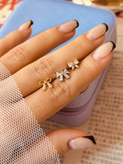 پیرسینگ گوش پاپیون