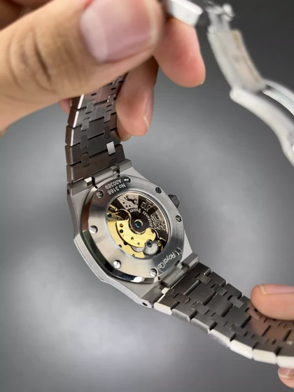 ساعت مچی اودمار پیگه اوپن هارت قاب شنی بدنه سیلور صفحه مشکی Audemars Piguet